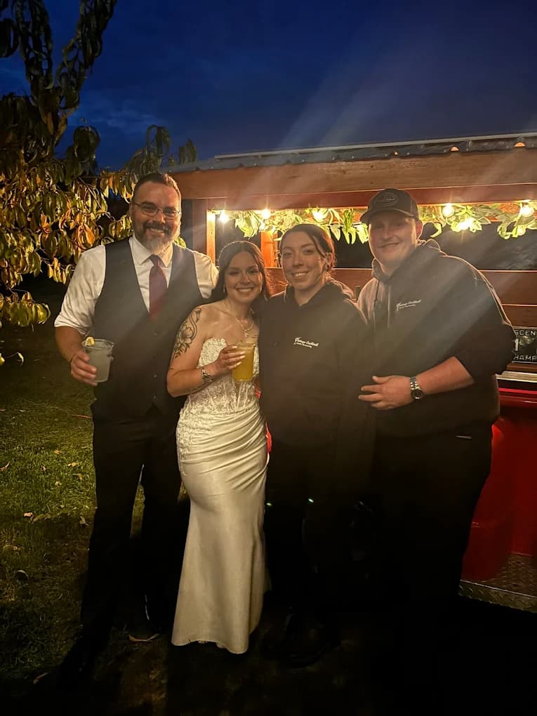 Mike and Haley from Vintage Cocktail with happy wedding couple